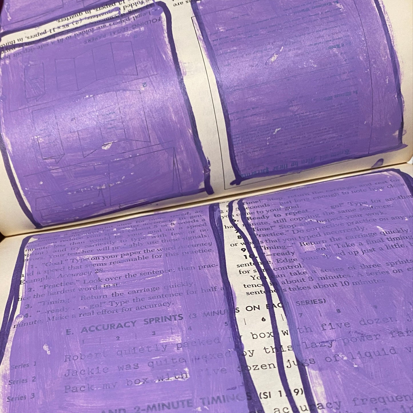 An example page in an art journal that has been set up like a comic. The sections are light purple and outlined in a dark purple paint pen.
