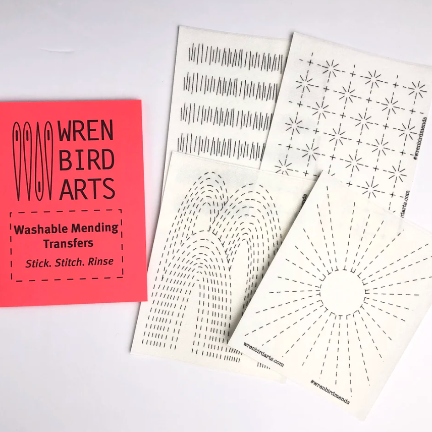 An example of each pattern included in the red sashiko washable mending transfers kit. There is a sun, rainbows, stars and hashmarks.