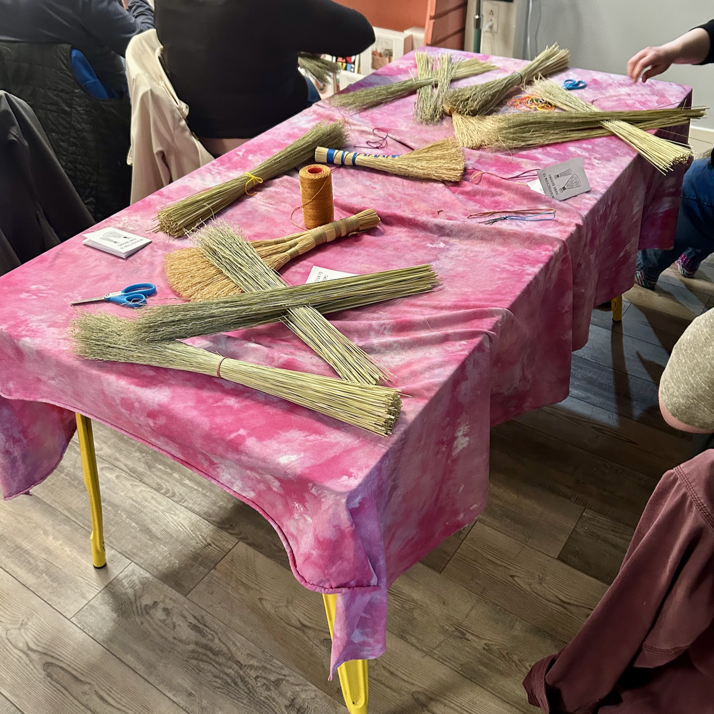 Hand broom class in progress.