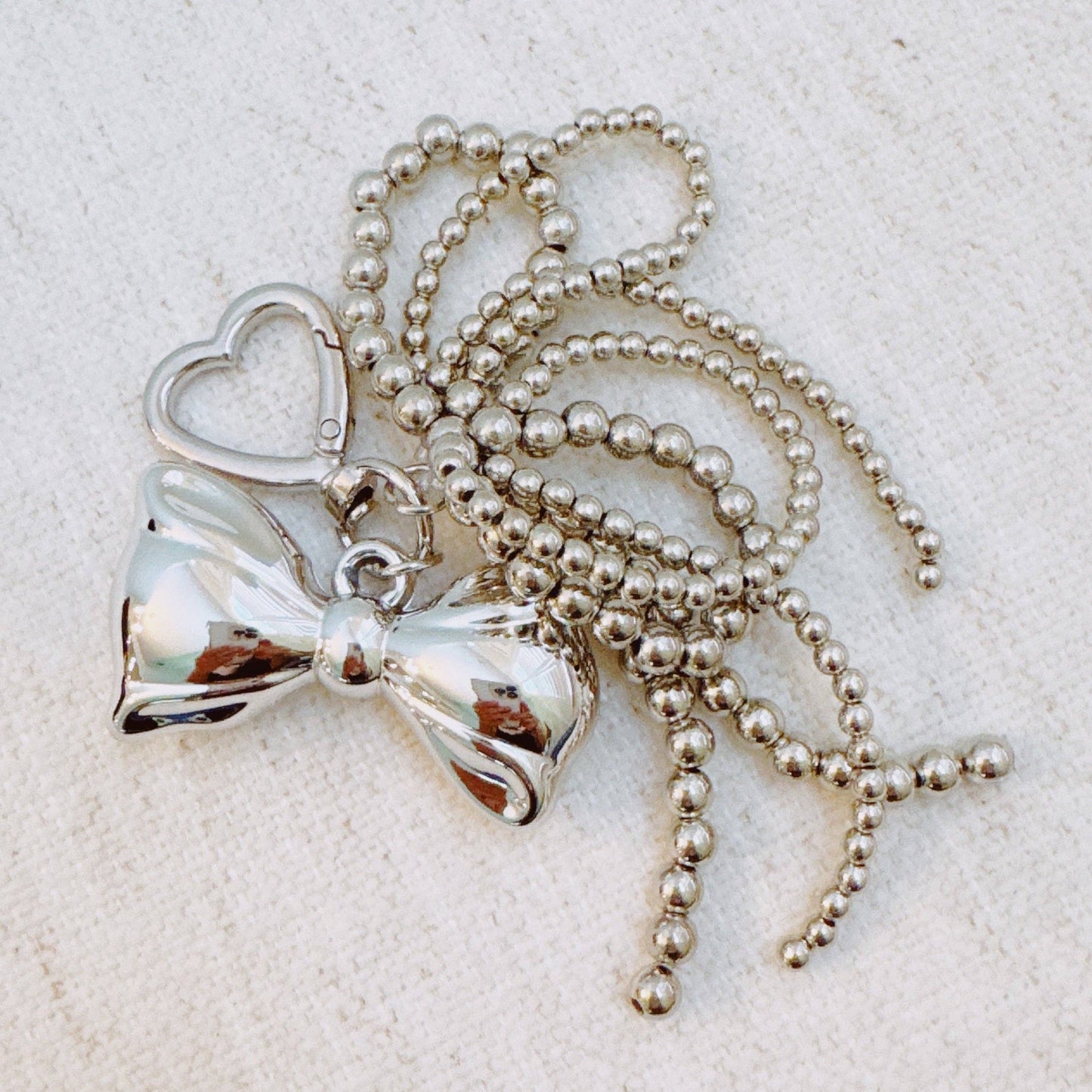 Silver Cascade Bow Charm Bag Charm