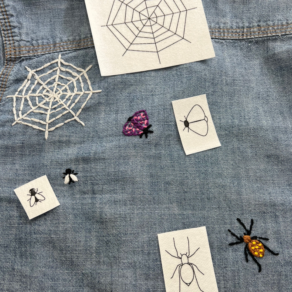 Stitched up versions of the spiderweb, fly, moth and another bug on a denim shirt.