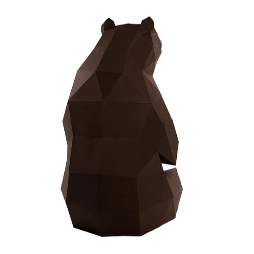 An example of a completed paper craft kit of a bear sitting down against a white background. The back of the bear is shown in this view.