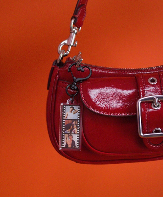 Connor + Hudson Film Strip Heated Rivalry Bag Charm