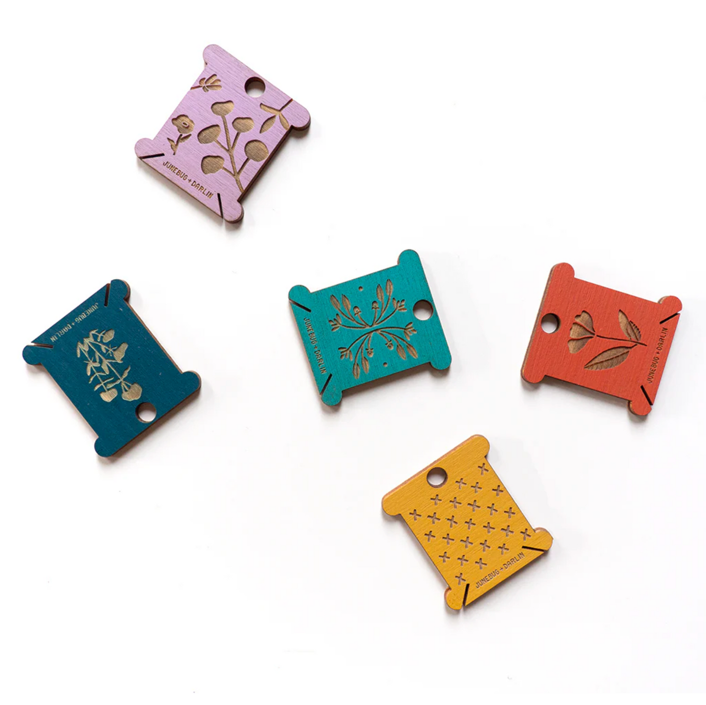 More examples of the designs and colors of floss bobbins you might receive in your random pack. 
