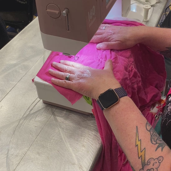 Video of a person doing free motion embroidery. The instructor says, "If it's a hot mess, that just means you're not done yet. Just keep stitching over it until you like it."