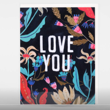 This greeting card has a black background with colorful florals. It says "Love you" in the middle in white letters. 